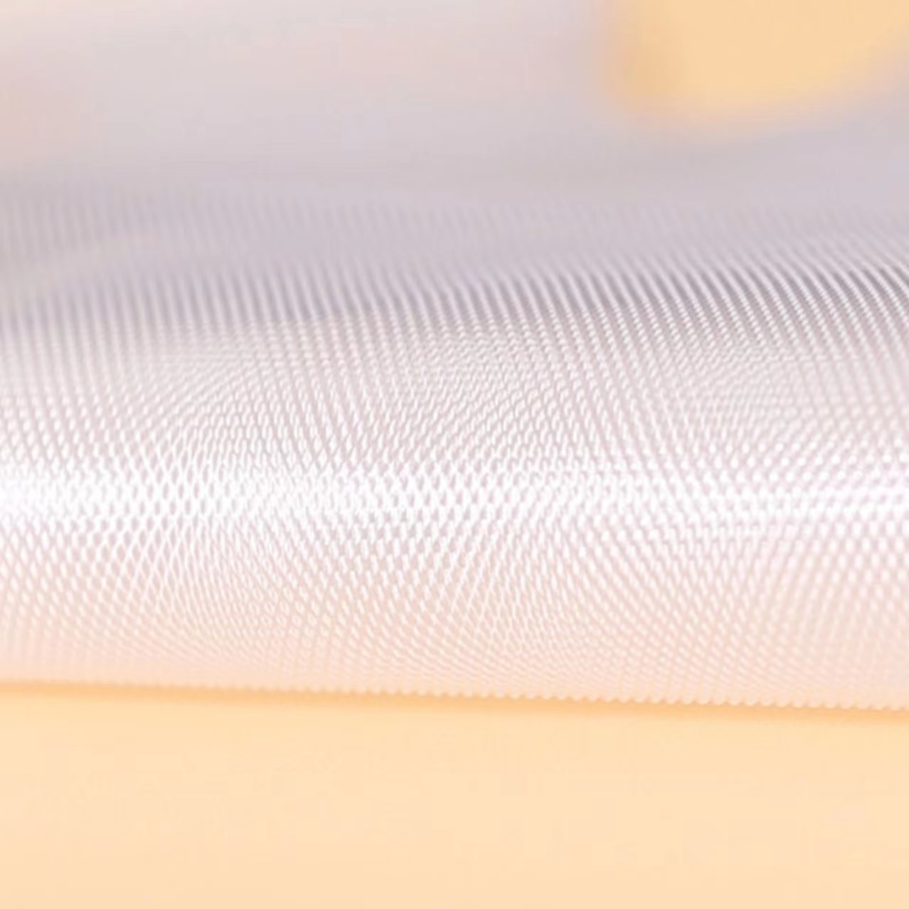 Miljøvenlige og bløde off-white TPE-handsker (diamantmønster) Miljøvenlige og bløde off-white TPE-handsker (diamantmønster)